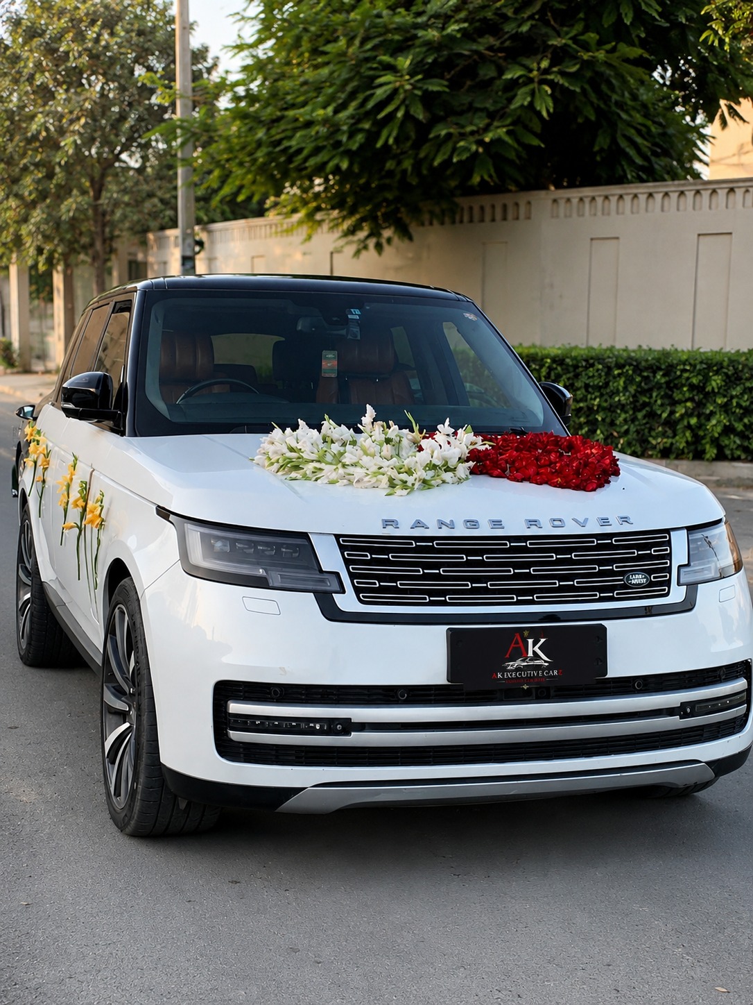 White luxury SUV in a showroom